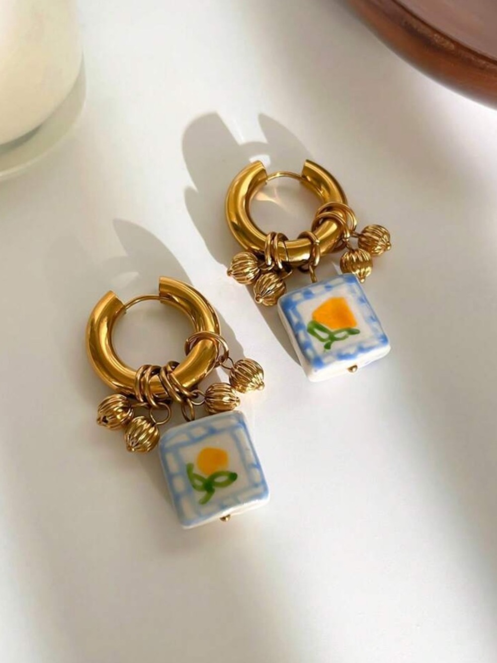 Anthropologie Gold Hoop Earrings with Blue & Yellow Floral Tiles